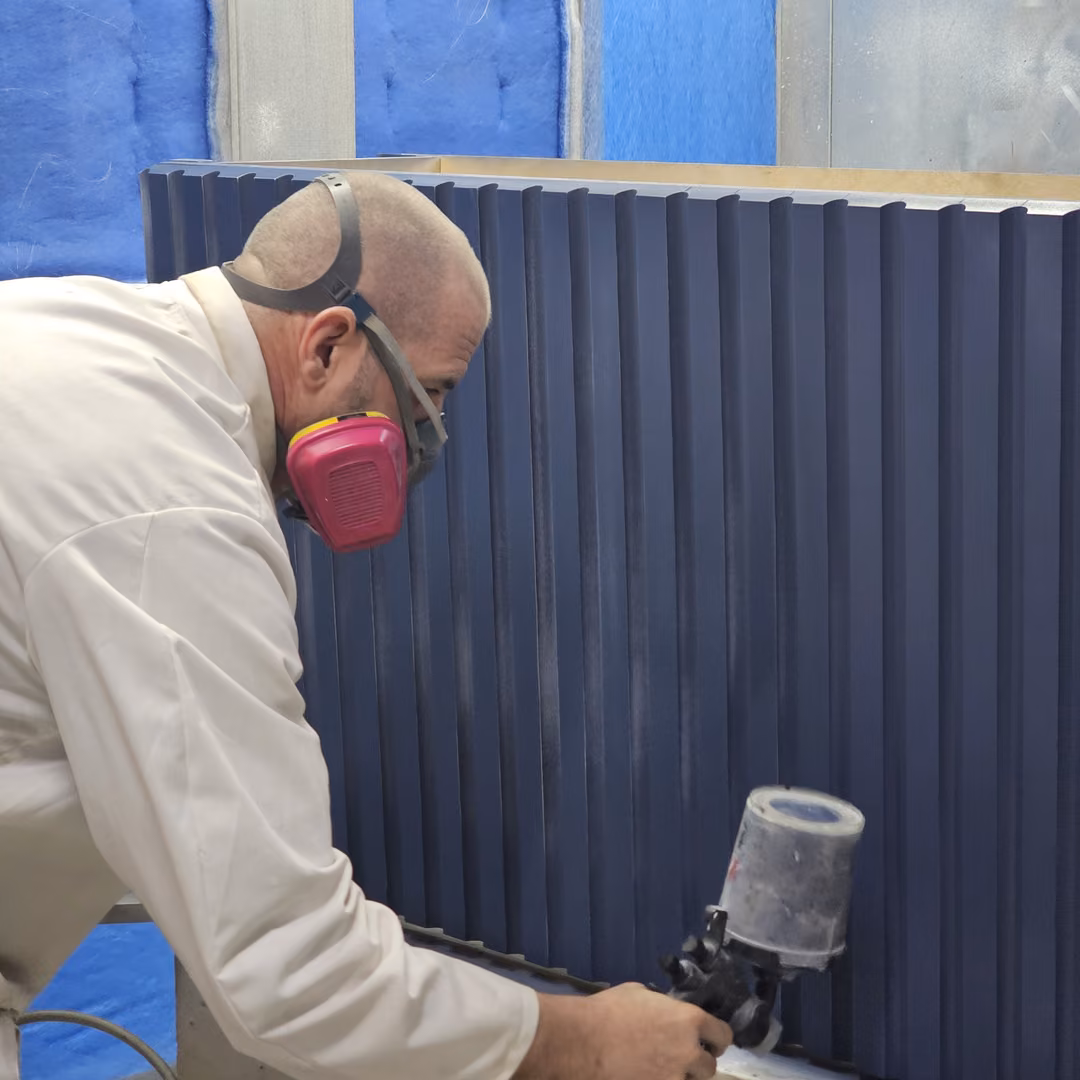 Spray finishing fluted panels in the 3R paint booth